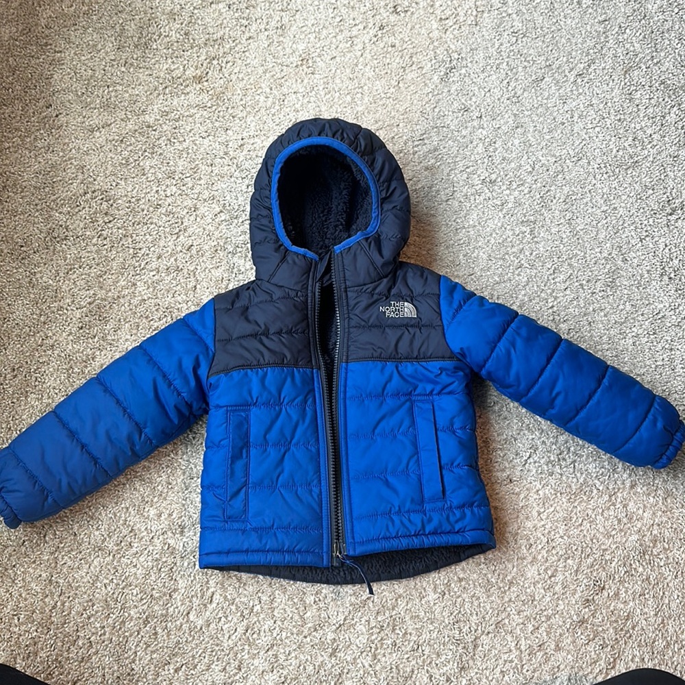 North face, like few 18-24 boys toddler reversible navy jacket.